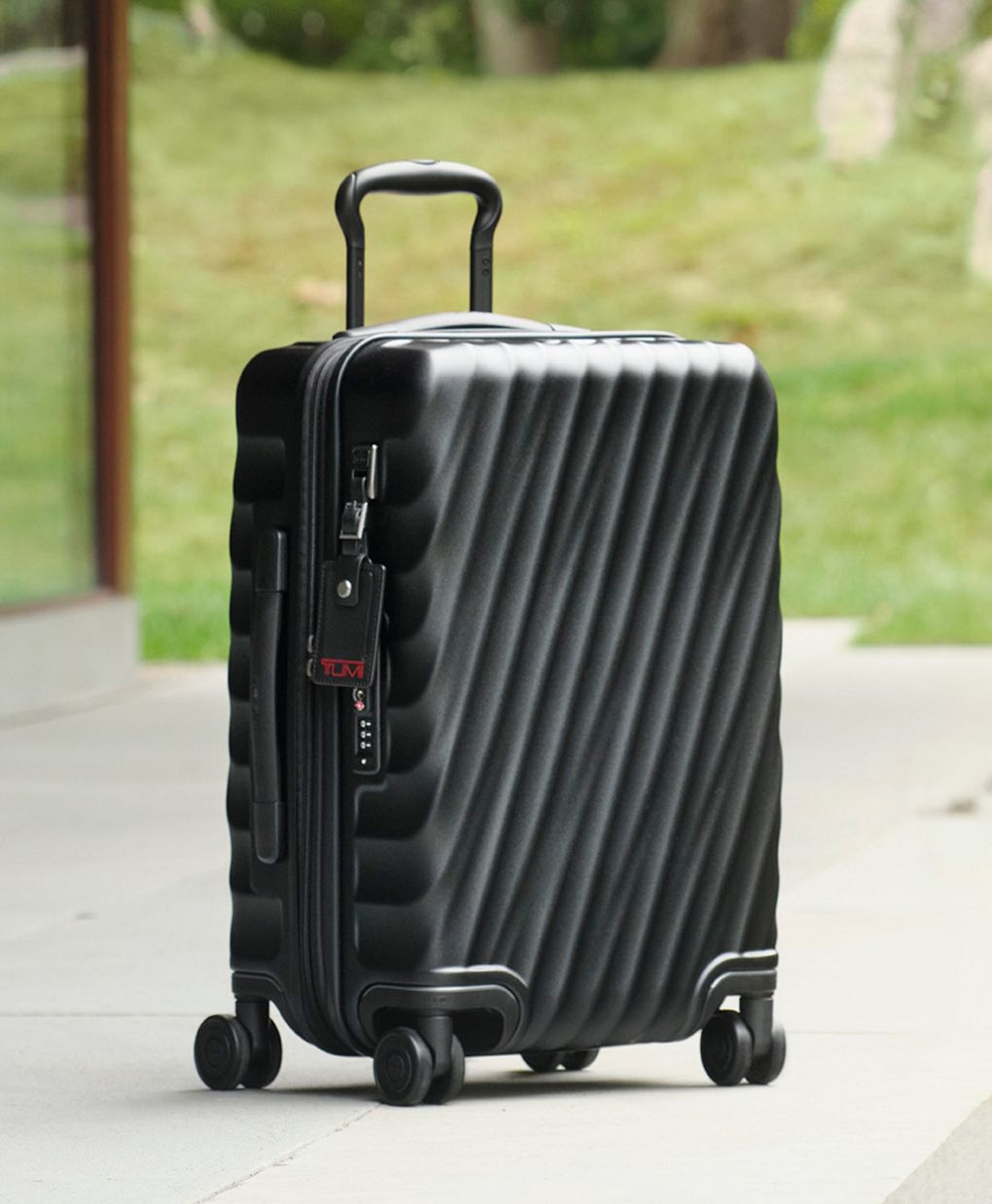 International Expandable 4 Wheeled Carry-On