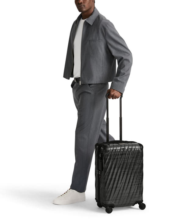International 4 Wheeled Carry-On