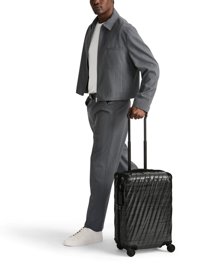 International 4 Wheeled Carry-On