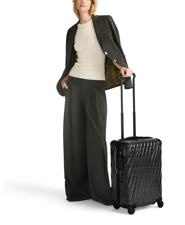 International 4 Wheeled Carry-On